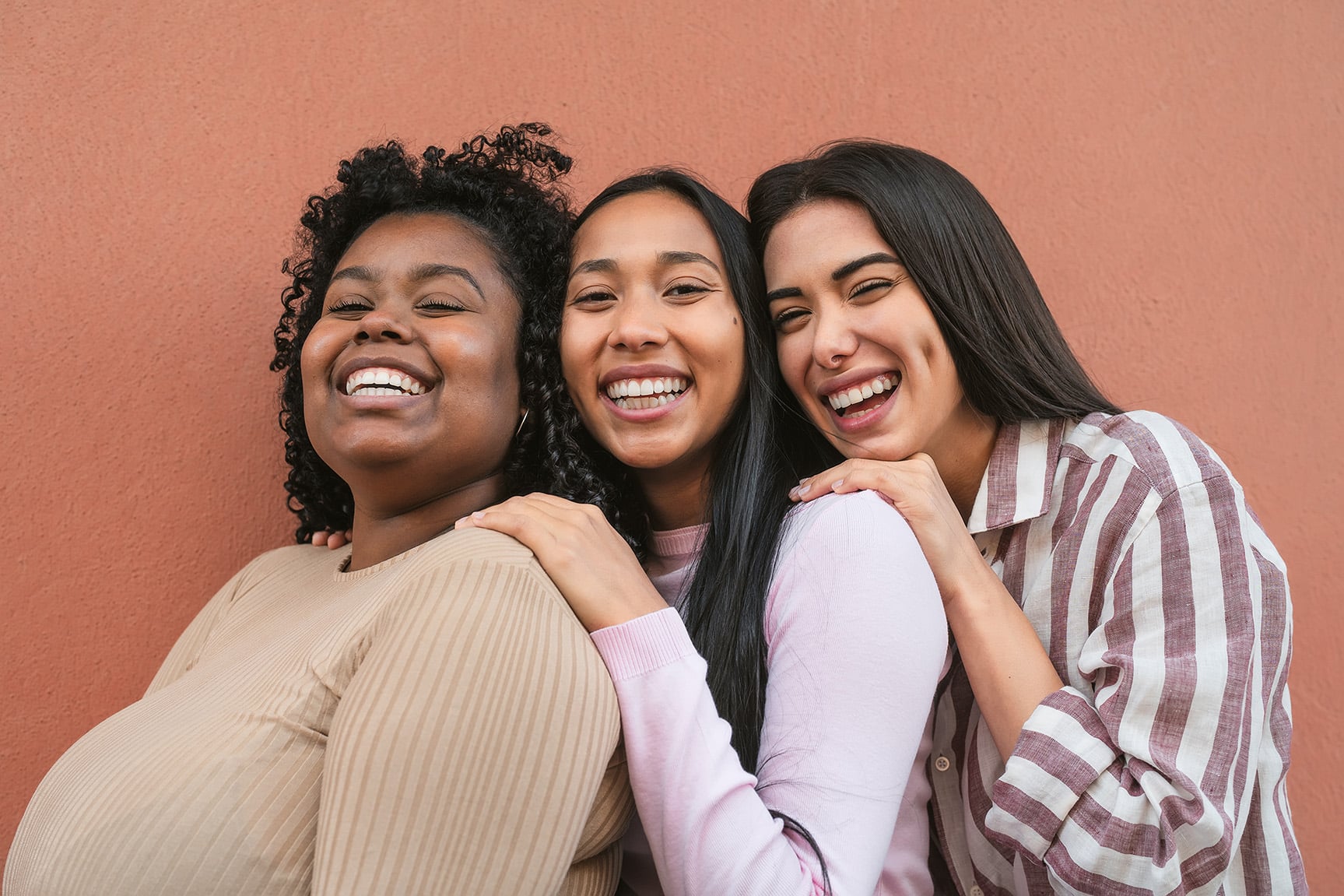 three friends smiling Bright Dental Studio in Bismarck, ND